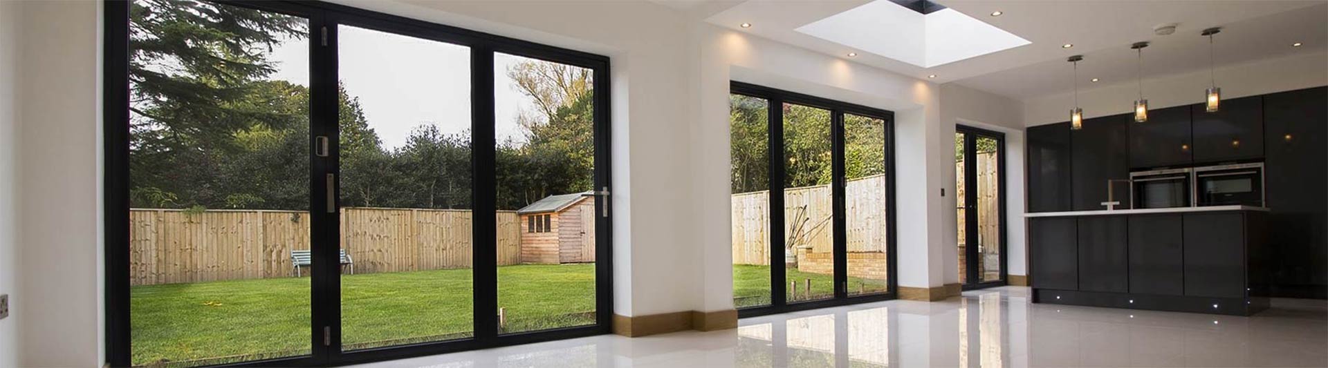 Installation of three sets of bifold doors to complete this multi use space in a new build home, Heswall.