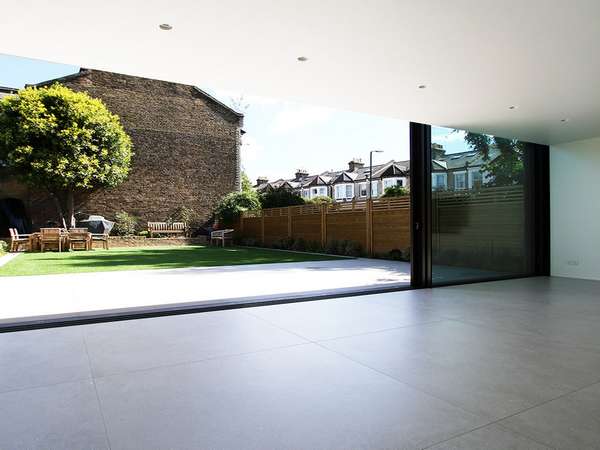 Triple Track Aluminium Slim line Sliding doors have arrived at John Knight glass. The Installtion of the Slim line Alumnium dors was carried out in Cheshire . Three doors slding gives the large opening needed on that sunny day, but also the large Glass pa