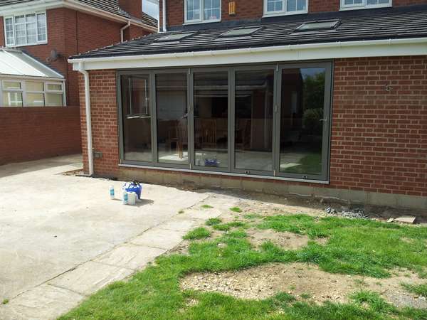 Warrington Cheshire Aluminium Bi folding doors by Centor. Triple glazed with 44mm Units Thermal U value .6 Artgon gas filled . Our Cheshire Bi fold window team would work with you to achieve the flush floor look that is so wanted.