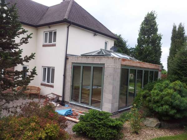 Mr B, Henbury, Cheshire : Orangery designed by FOB Architects Installation of Centor C1 Bi-fold doors with triple glazing and sprayed in RAL 7033 paint. Installation off an Aluminium spared ATS roof system with electric opening vents.