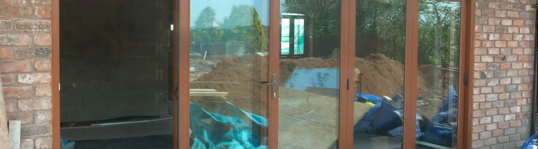 Traditional timber folidng door, North Wales.