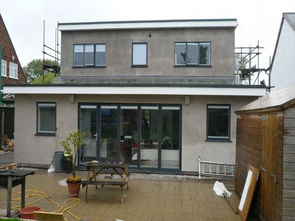 West Kirby Wirral : Installation of Slimfold A10 Bi fold doors double glazed U value 1.4 . 300 series Aluminium windows double glazed. Morley Internal blinds to all glass units