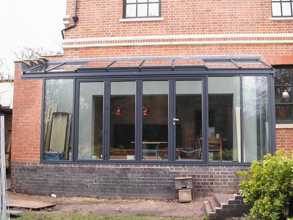 Mr D: Coventry: Instalation of Allstyle aluminium windows triple glazed in a marine finish polyester powder coating: Ral 7016: centor C1 triple glazed bifold doors with 44 mm units U Value 0.7