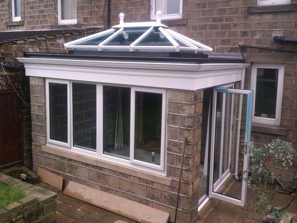 Doctor C: Ruthin North Wales : Design and |Biuld of an orangery showing a set Classic S1. Bi fold doors